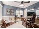 This office features blue and beige walls, a ceiling fan, and two workstations at 22415 N 34Th Ln, Phoenix, AZ 85027