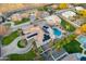 Expansive property features mature landscaping, a private pool, and a tennis court at 22477 S 197Th Cir, Queen Creek, AZ 85142