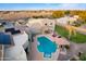 Beautiful aerial view of this estate featuring a pool, lush landscaping, and multiple structures at 22477 S 197Th Cir, Queen Creek, AZ 85142