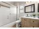 Bathroom featuring wooden vanity and a walk-in shower at 22477 S 197Th Cir, Queen Creek, AZ 85142