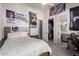 Comfortable carpeted bedroom featuring a closet and bathroom at 22477 S 197Th Cir, Queen Creek, AZ 85142