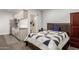 Comfortable bedroom featuring a kitchenette and a private bathroom at 22477 S 197Th Cir, Queen Creek, AZ 85142