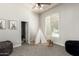 Charming bonus room filled with playful decor, perfect for a play area at 22477 S 197Th Cir, Queen Creek, AZ 85142