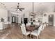 Spacious dining room in an open-concept layout flows into the kitchen and living spaces at 22477 S 197Th Cir, Queen Creek, AZ 85142
