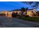 Lovely home with a well-manicured lawn and inviting driveway, perfect for families at 22477 S 197Th Cir, Queen Creek, AZ 85142