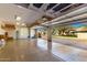 A spacious, well-lit garage with clean flooring and ample storage at 22477 S 197Th Cir, Queen Creek, AZ 85142
