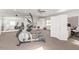 Spacious workout room with mirrored wall and exercise equipment, designed for fitness and well-being at 22477 S 197Th Cir, Queen Creek, AZ 85142