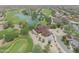 Aerial view of clubhouse near golf course and community at 22488 N Mulligan Dr, Maricopa, AZ 85138