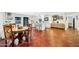 Charming dining area with rustic wooden table and terracotta tile flooring at 2323 E Concorda Dr, Tempe, AZ 85282