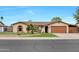 Single-story home with a landscaped yard and attached garage at 2323 E Concorda Dr, Tempe, AZ 85282