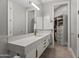 Clean bathroom with a large mirror and walk-in closet at 23238 N 94Th Pl, Scottsdale, AZ 85255