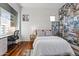 Cozy bedroom with built-in desk and photo wall at 23238 N 94Th Pl, Scottsdale, AZ 85255