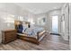 Elegant bedroom with wooden furniture and natural light at 23238 N 94Th Pl, Scottsdale, AZ 85255