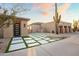 Stunning curb appeal with a landscaped front yard and two-car garage at 23238 N 94Th Pl, Scottsdale, AZ 85255