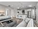 Modern kitchen with white cabinetry, island, and stainless steel appliances at 23238 N 94Th Pl, Scottsdale, AZ 85255