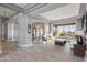 Bright and spacious living area with hardwood floors and large windows at 23238 N 94Th Pl, Scottsdale, AZ 85255