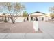 Modern mid-century home with clean lines and attractive landscaping at 2408 W Willow Ave, Phoenix, AZ 85029