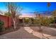 Enclosed garden area with raised garden beds at 2444 E Del Rio Dr, Tempe, AZ 85282