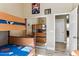 ' bedroom with two bunk beds, wood floors, and a sliding mirror door closet at 31016 N 42Nd Way, Cave Creek, AZ 85331