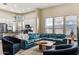 Bright living room with large windows, and an open layout adjacent to the kitchen area, perfect for entertaining at 31016 N 42Nd Way, Cave Creek, AZ 85331
