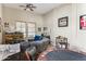 Inviting living room with comfortable seating, a TV, and a poker table for entertainment, perfect for relaxing evenings at 31016 N 42Nd Way, Cave Creek, AZ 85331