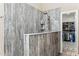 Sleek shower with modern fixtures, built-in shelving, and an adjacent walk-in closet for convenient storage at 31016 N 42Nd Way, Cave Creek, AZ 85331