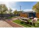 Charming backyard featuring artificial turf and a seating area at 3132 N 15Th Ave, Phoenix, AZ 85015