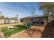 Spacious backyard with turf, seating, and games for outdoor fun at 3132 N 15Th Ave, Phoenix, AZ 85015