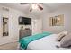 Comfortable bedroom with mounted TV and stylish decor at 3132 N 15Th Ave, Phoenix, AZ 85015