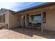 Inviting front porch with a cozy seating area and charming architectural details for relaxing outdoor enjoyment at 3132 N 15Th Ave, Phoenix, AZ 85015