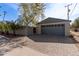 Spacious detached garage with ample parking space and a secure gate for added privacy and convenience at 3132 N 15Th Ave, Phoenix, AZ 85015