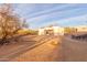 Backyard featuring outdoor seating around a fire pit, perfect for desert ambiance at 37327 N 16Th St, Phoenix, AZ 85086