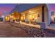 Relaxing outdoor space featuring covered patio with seating, ideal for enjoying the evening at 37327 N 16Th St, Phoenix, AZ 85086