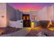 Gated front entrance with beautiful desert landscaping under a colorful sky at 37327 N 16Th St, Phoenix, AZ 85086