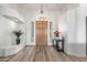 Bright, open foyer featuring hardwood floors, high ceilings and modern chandelier at 37327 N 16Th St, Phoenix, AZ 85086