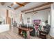 Spacious living room with beamed ceilings, hardwood floors and comfortable seating at 37327 N 16Th St, Phoenix, AZ 85086