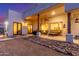 Covered patio featuring comfortable seating and outdoor dining area, perfect for entertaining at 37327 N 16Th St, Phoenix, AZ 85086