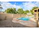 Inviting swimming pool with diving board and flagstone patio at 402 W Augusta Ave, Phoenix, AZ 85021