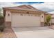 Inviting single-story home with desert landscaping, neutral color scheme, and a spacious two-car garage at 41219 W Brandt Dr, Maricopa, AZ 85138