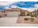 Inviting single-story home with desert landscaping, neutral color scheme, and a spacious two-car garage at 41219 W Brandt Dr, Maricopa, AZ 85138