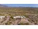 Beautiful aerial shot of large home in desert community with mountain views at 4185 S Redtail Trl, Gold Canyon, AZ 85118