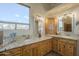 Dual sink bathroom vanity with granite countertop and ample storage at 4185 S Redtail Trl, Gold Canyon, AZ 85118