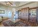 Inviting living room with built-in shelving and views of the hallway at 4185 S Redtail Trl, Gold Canyon, AZ 85118