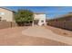 Large backyard with patio and mature tree providing shade at 44231 W Roth Rd, Maricopa, AZ 85138