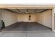 Attached garage with ample space for parking and storage at 44231 W Roth Rd, Maricopa, AZ 85138