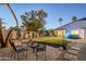 Charming backyard patio with outdoor seating and landscaping, ideal for enjoying outdoor living at 5507 E Grandview Rd, Scottsdale, AZ 85254