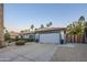 Charming home with a 2-car garage, beautiful desert landscaping, and a private gated courtyard at 5507 E Grandview Rd, Scottsdale, AZ 85254