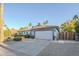 Charming single-story home featuring a well-maintained front yard and attached two-car garage at 5507 E Grandview Rd, Scottsdale, AZ 85254