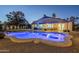 Serene backyard pool and patio with a hot tub, perfect for enjoying outdoor living and relaxation at 5507 E Grandview Rd, Scottsdale, AZ 85254
