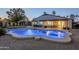 Expansive backyard showcasing a beautiful pool, hot tub, covered patio with outdoor seating, ideal for relaxation and recreation at 5507 E Grandview Rd, Scottsdale, AZ 85254